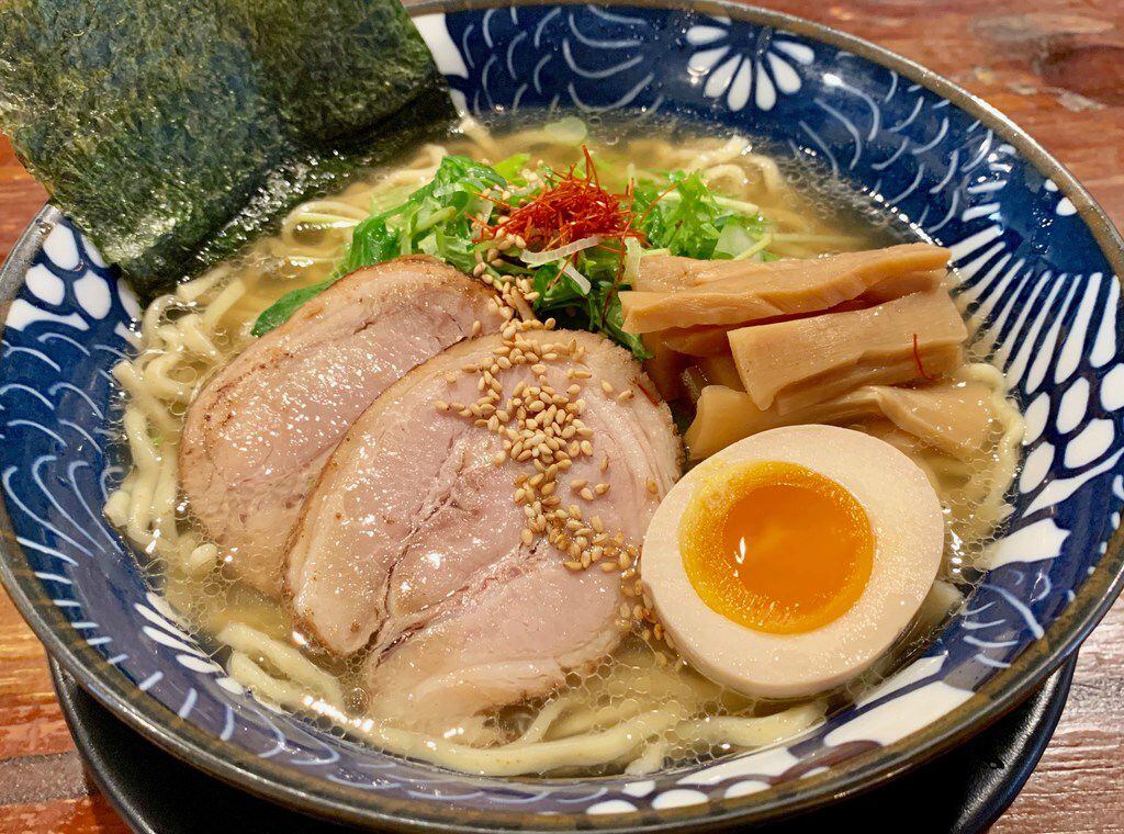 Hinodeya's namesake ramen is made with dashi broth and topped with chashu pork, soft cooked...