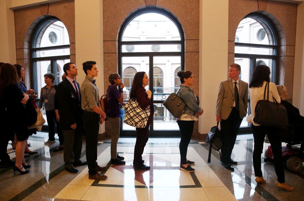People wait in the sign up line to give a testimony as members of the Senate State Affairs Committee debate and hear public testimony of Senate Bill 6, the transgender bathroom bill, at the Texas State Capitol in Austin on Tuesday, March 7, 2017. The bill would bar transgender people from using the restrooms, locker and changing rooms that correspond to their gender identity in public schools and government buildings. (Rose Baca/The Dallas Morning News)