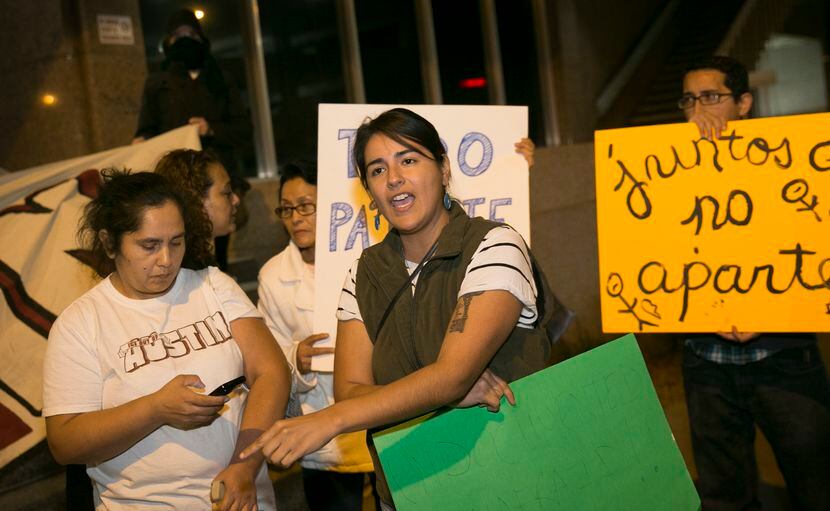Alicia Torres speaks at a protest organized by "ICE Out Of Austin" at the J.J. Jake Pickle...