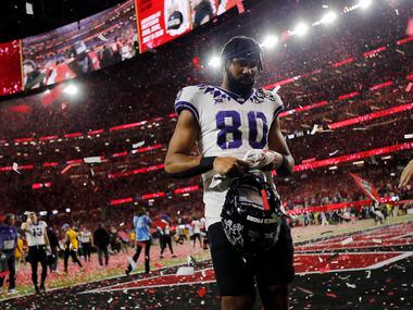 As Georgia Bulldogs red confetti rains down, TCU Horned Frogs tight end D'Andre Rogers (80)...
