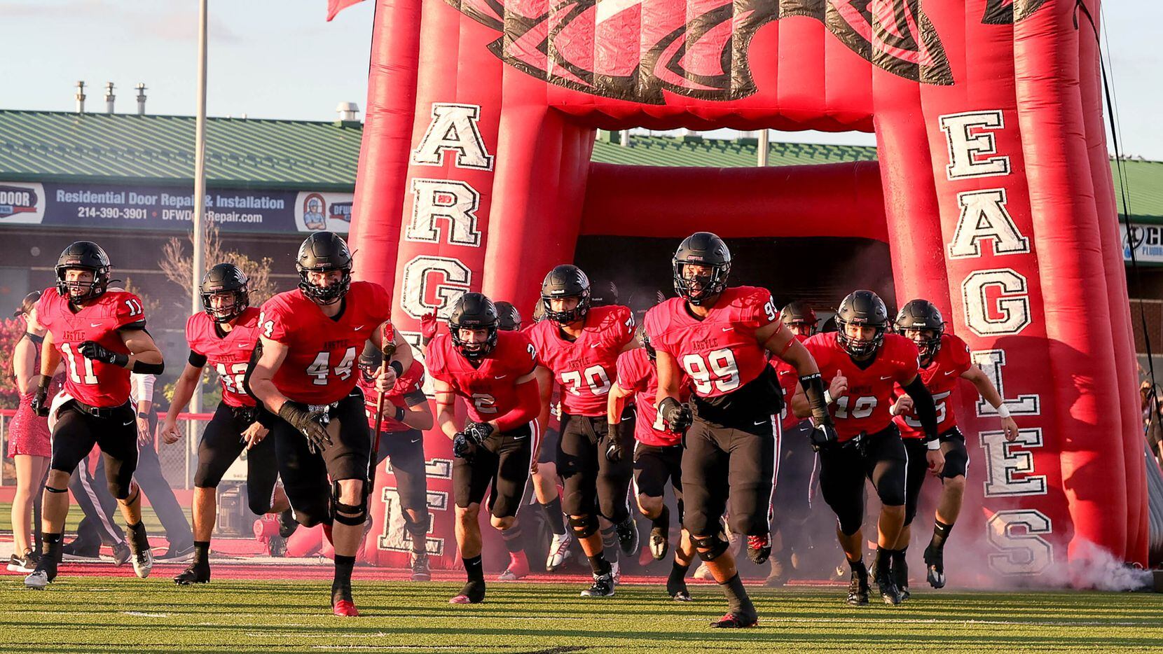 The Argyle Eagles enter the field to face Melissa in a high school football game played on...