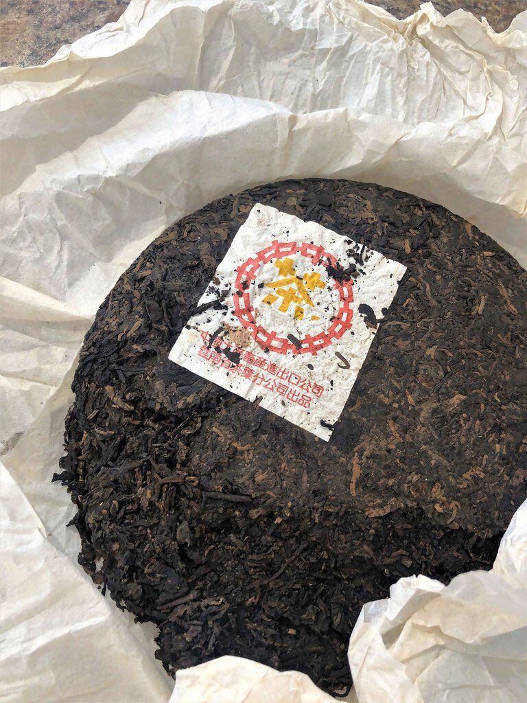 A sheng style pu'er tea in a disk form at The Cultured Cup.