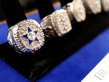 Andrie has a collection of Super Bowl rings, including Super Bowl VI (left), which he earned...