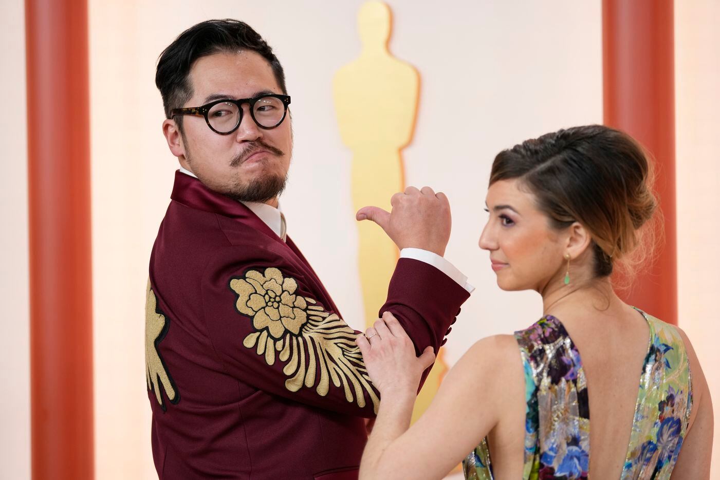 Daniel Kwan, left, and Kirsten Lepore arrive at the Oscars on Sunday, March 12, 2023, at the...