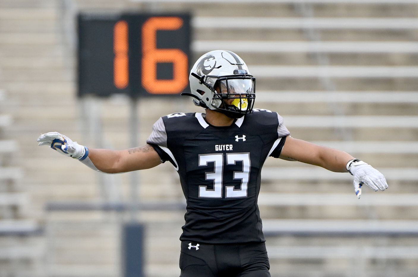 Denton Guyer's Marquan Pope (33) motions before a play in the first half of a Class 6A Division II Region I final high school playoff football game between Denton Guyer and Prosper, Saturday, Dec. 4, 2021, in Allen, Texas. Celina won 34-0. (Matt Strasen/Special Contributor)