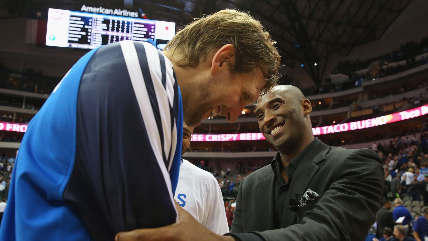 Dirk Nowitzki #41 of the Dallas Mavericks greets Kobe Bryant #24 of the Los Angeles Lakers...