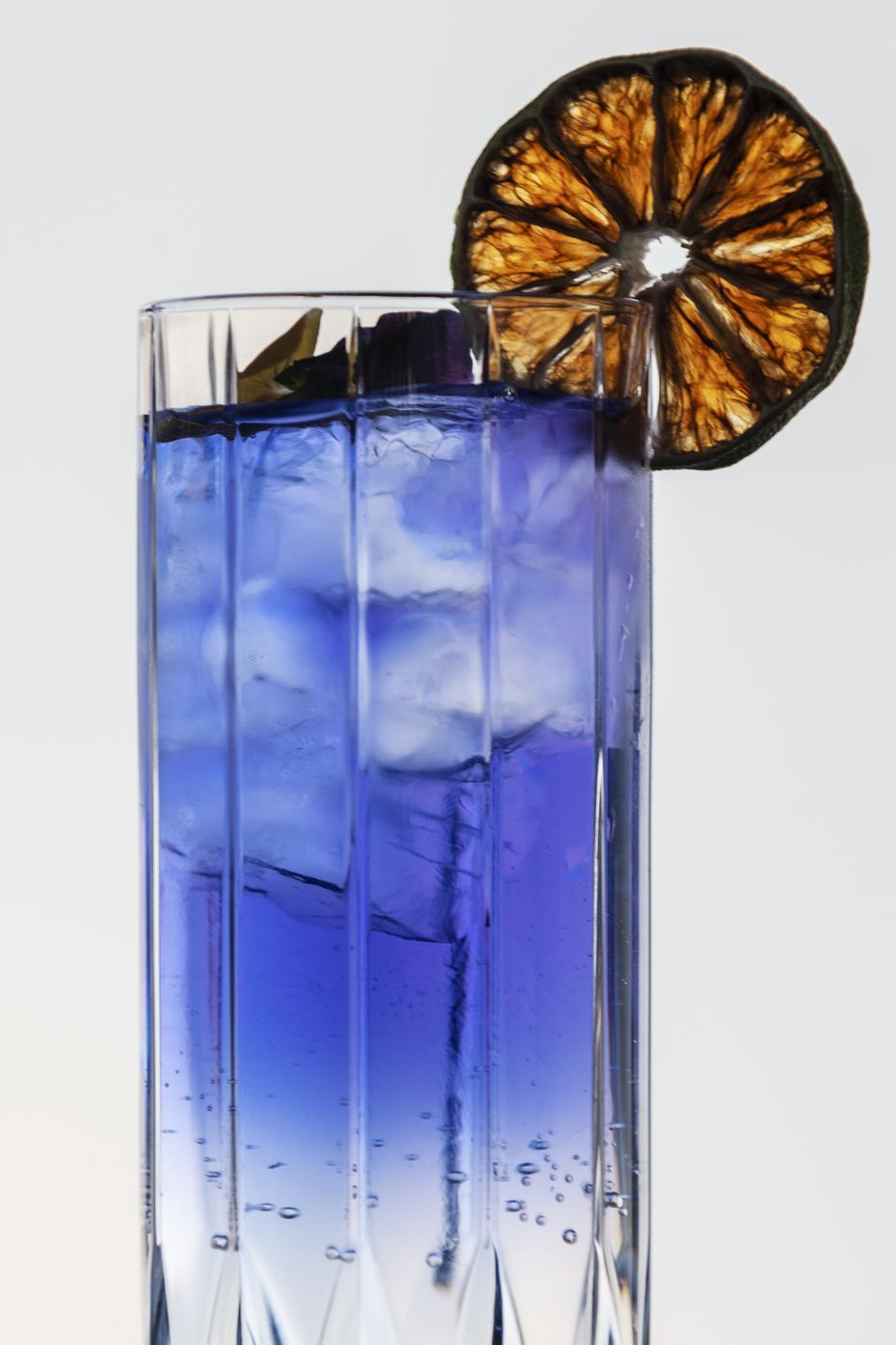 The Âme G&T cocktail is bright in color, from the Empress 1908 gin.