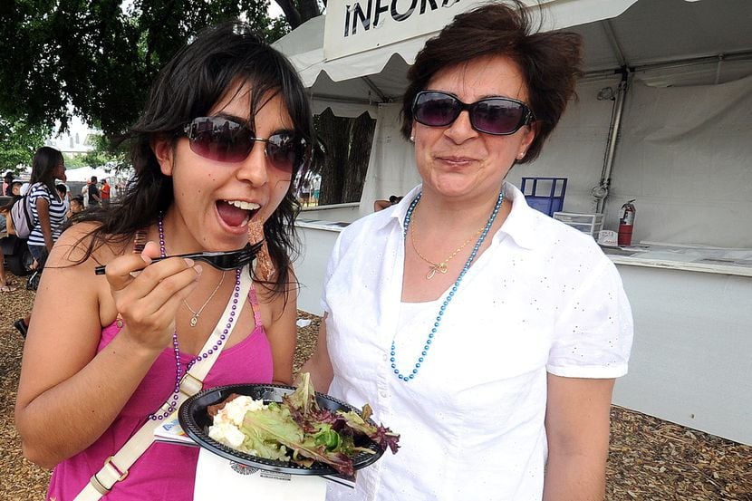 Festival goers share a plate at Taste Addison.