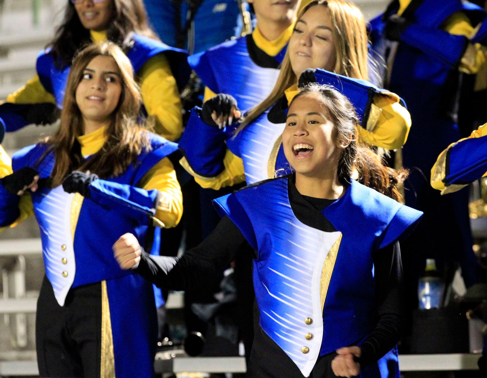 Sunnyvale band members dance in the stands during the first half of a high school football...