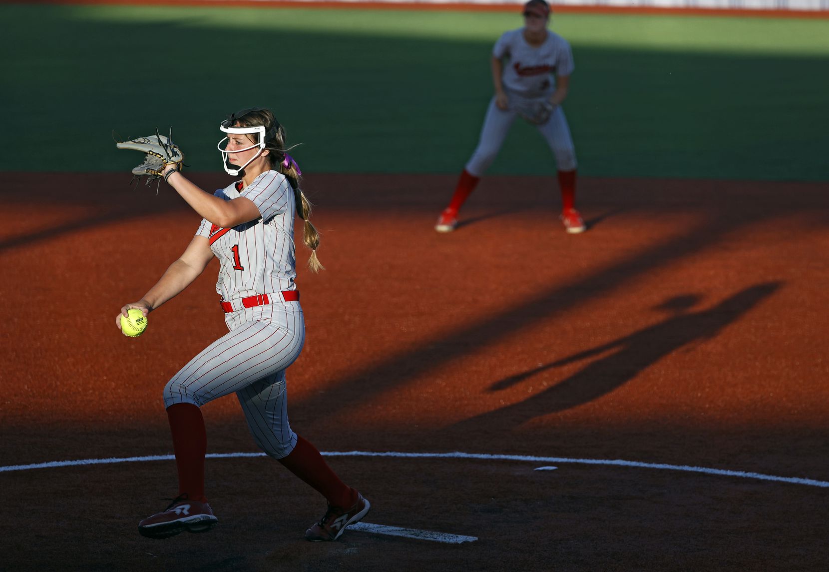 Flower Mound Marcus' Faith Drissel (1) pitches the ball during the game against El Paso...