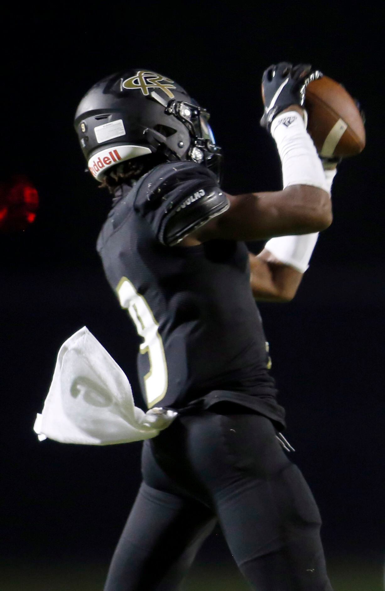 Royse City receiver Sir Hill (9) reaches to pull in a reception during second quarter action...