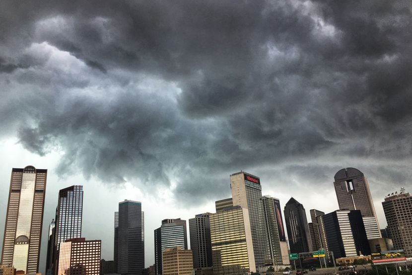 Ominous looking storm clouds roll over downtown Dallas in this file photo.