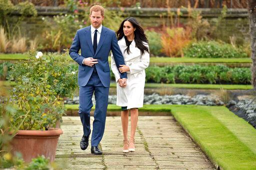El príncipe Harry y su prometida Meghan Markle./AP
