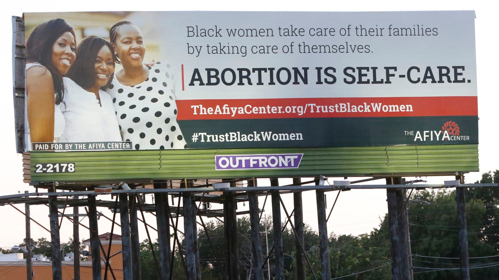 A billboard put up in 2018 by the Dallas-based Afiya Center proclaimed "abortion is self-care" and included the hashtag #TrustBlackWomen. This billboard was in response to another one, from the Black Pro Life Coalition, that proclaimed "abortion is not healthcare."