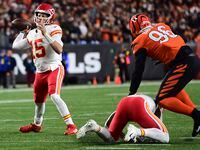 Kansas City Chiefs quarterback Patrick Mahomes (15) throws a pass during an NFL football...