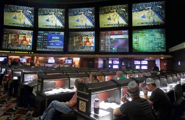 
Each year, gamblers flock to the sports book at the Las Vegas Hotel & Casino and others to...