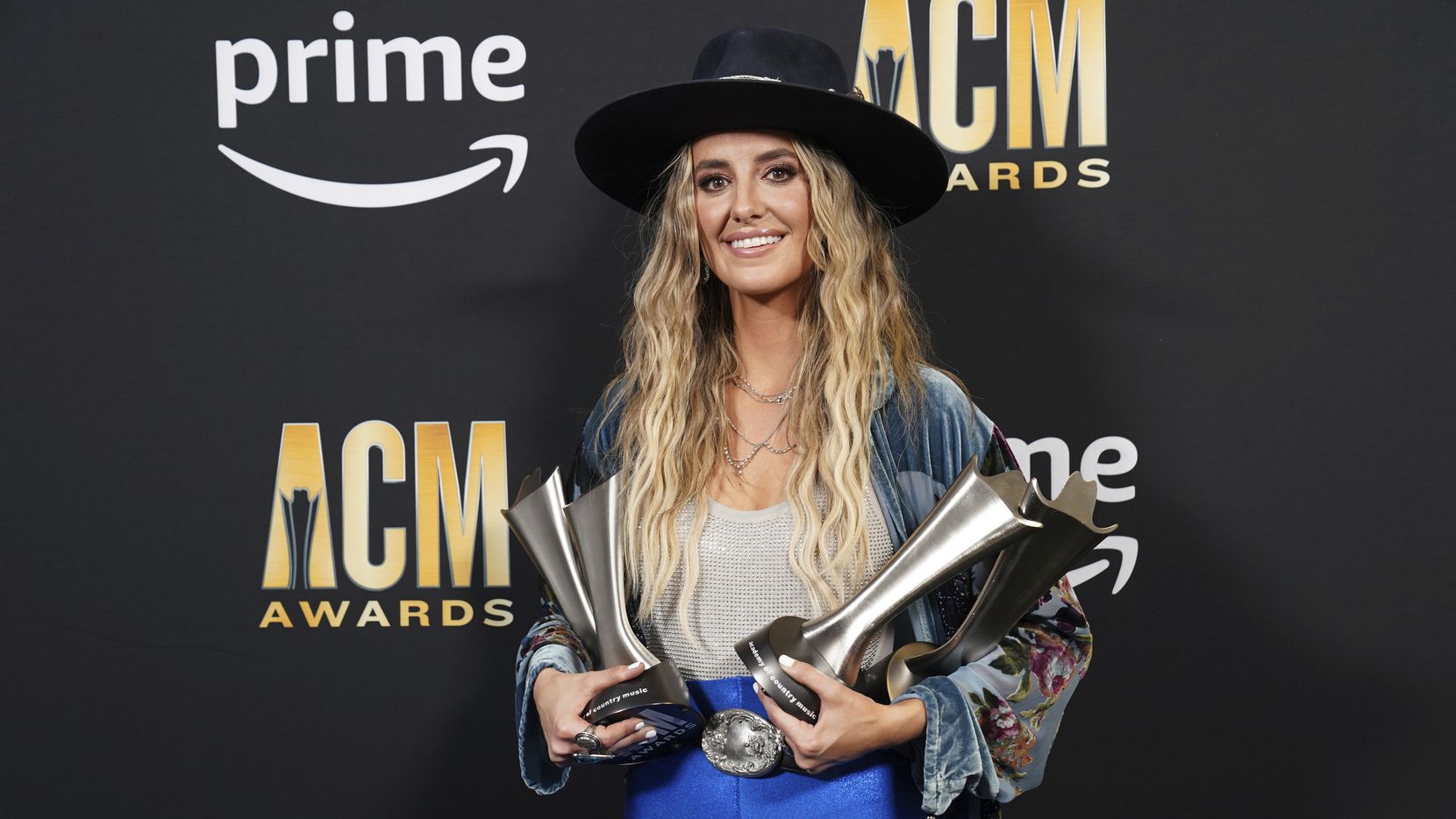 Lainey Wilson poses with the awards for album of the year for "Bell Bottom Country", female...
