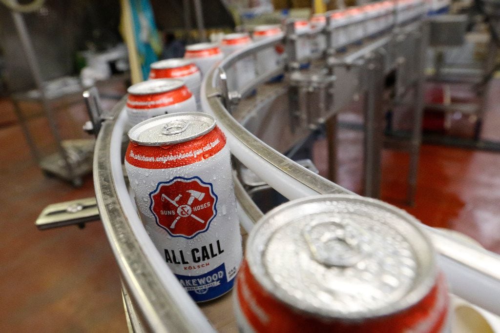 Cans of "All Call", a kolsch or German blonde, one of the core brands at Lakewood Brewing...