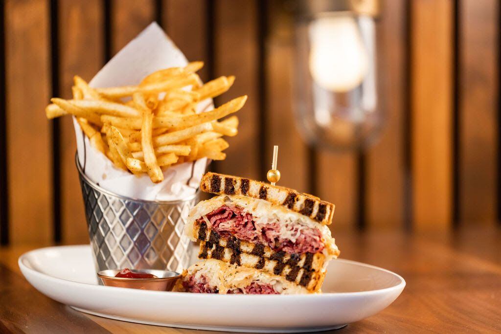 Among the four sandwiches on Ramble Room's dinner menu is a corned beef Reuben on marble...
