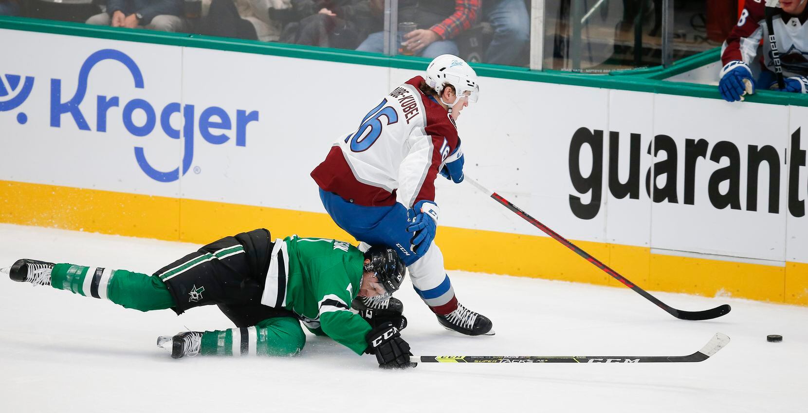 Dallas Stars forward Jason Robertson (21) battles Colorado Avalanche forward Nicolas Aube-Kubel (16) for the puck during the first period of an NHL hockey game in Dallas, Friday, November 26, 2021. (Brandon Wade/Special Contributor)