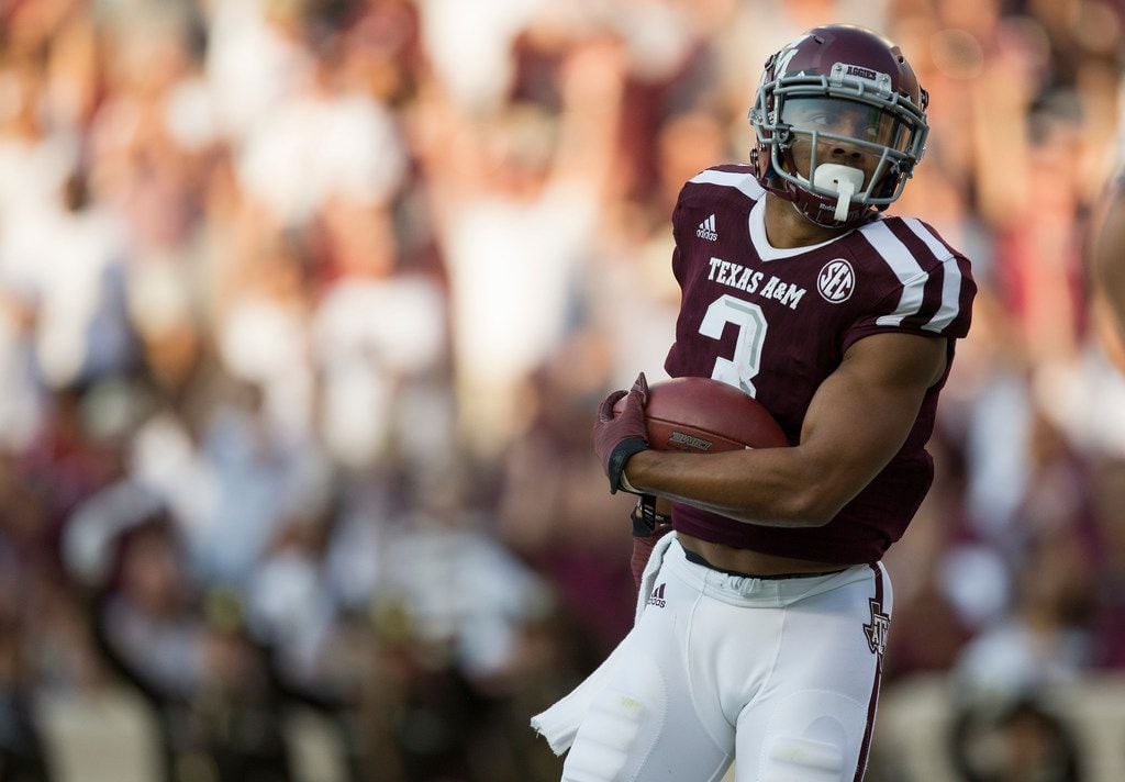 Texas A&M wide receiver Christian Kirk (3) turns into the end zone after catching a pass for a touchdown against Nicholls State during the first quarter of an NCAA college football game Saturday, Sept. 9, 2017, in College Station, Texas. (AP Photo/Sam Craft)