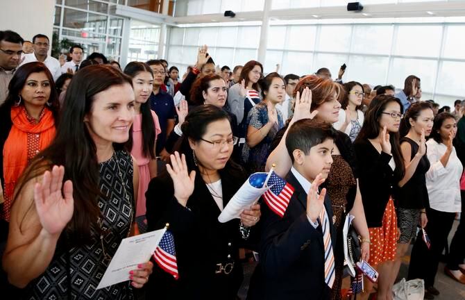 
New American citizens took the Oath of Allegiance at a naturalization ceremony this month...