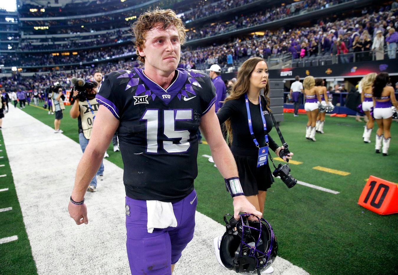 TCU Horned Frogs quarterback Max Duggan (15) walks to the locker room after losing to the...