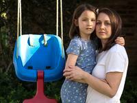 Cassie Morrison, a mom of three, with her oldest, Ava, 7, at their home on Thursday, May 26,...