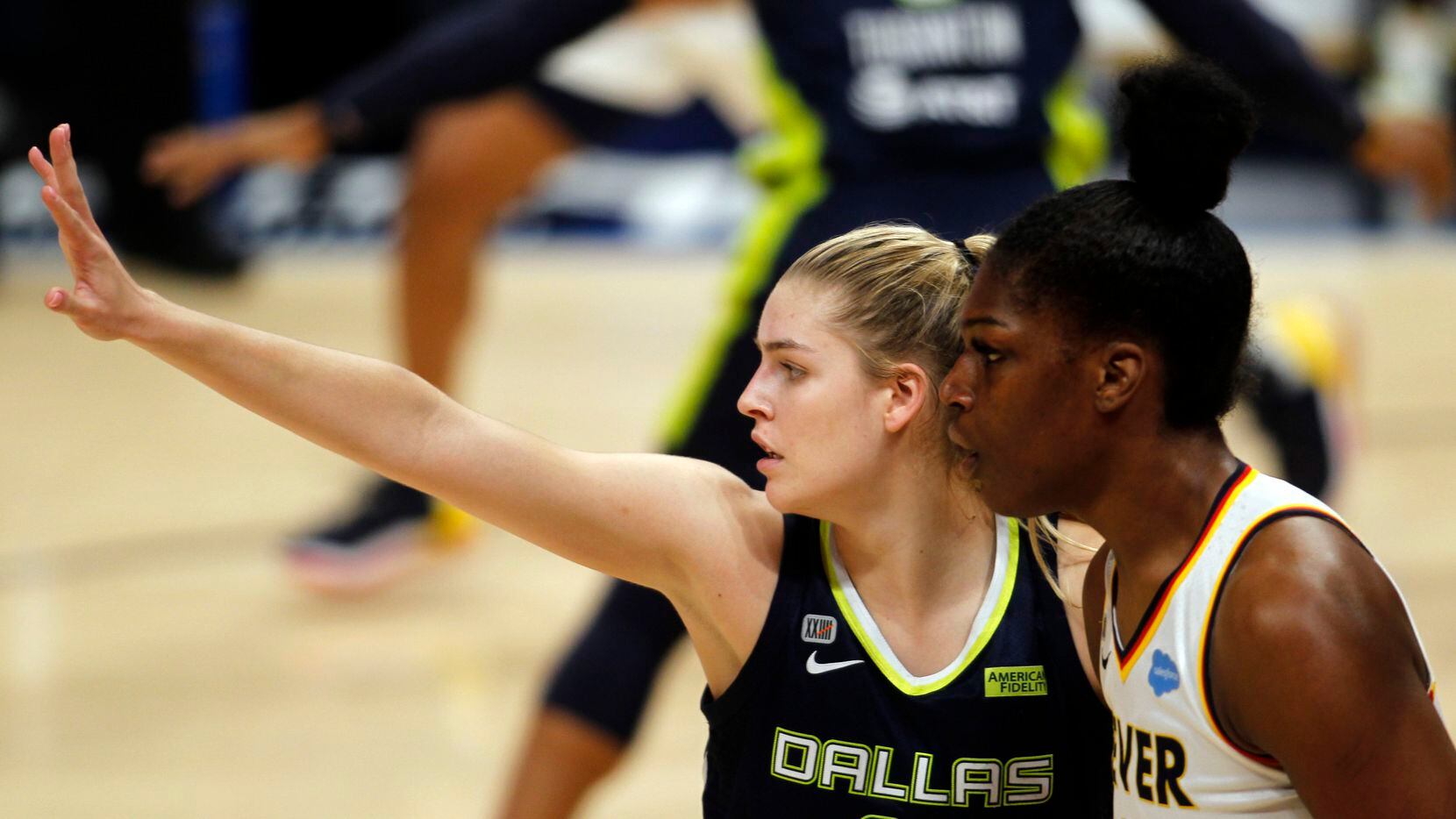 Dallas Wings center Bella Alarie (32) defends inside against Indiana Fever center Teaira...
