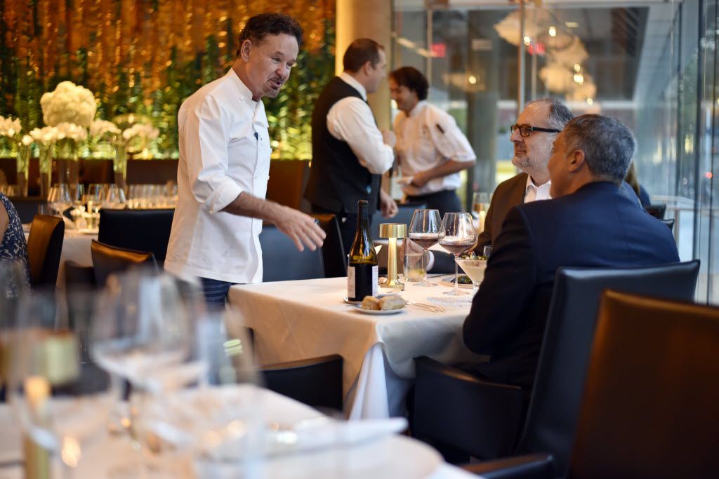 Stephan Pyles speaks with patrons in the dining room of his new restaurant, Stephan Pyles...