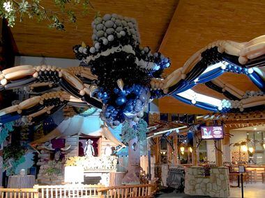 A spider made of 4,040 balloons greets guests in the lobby during Great Wolf Lodge's Halloween season.