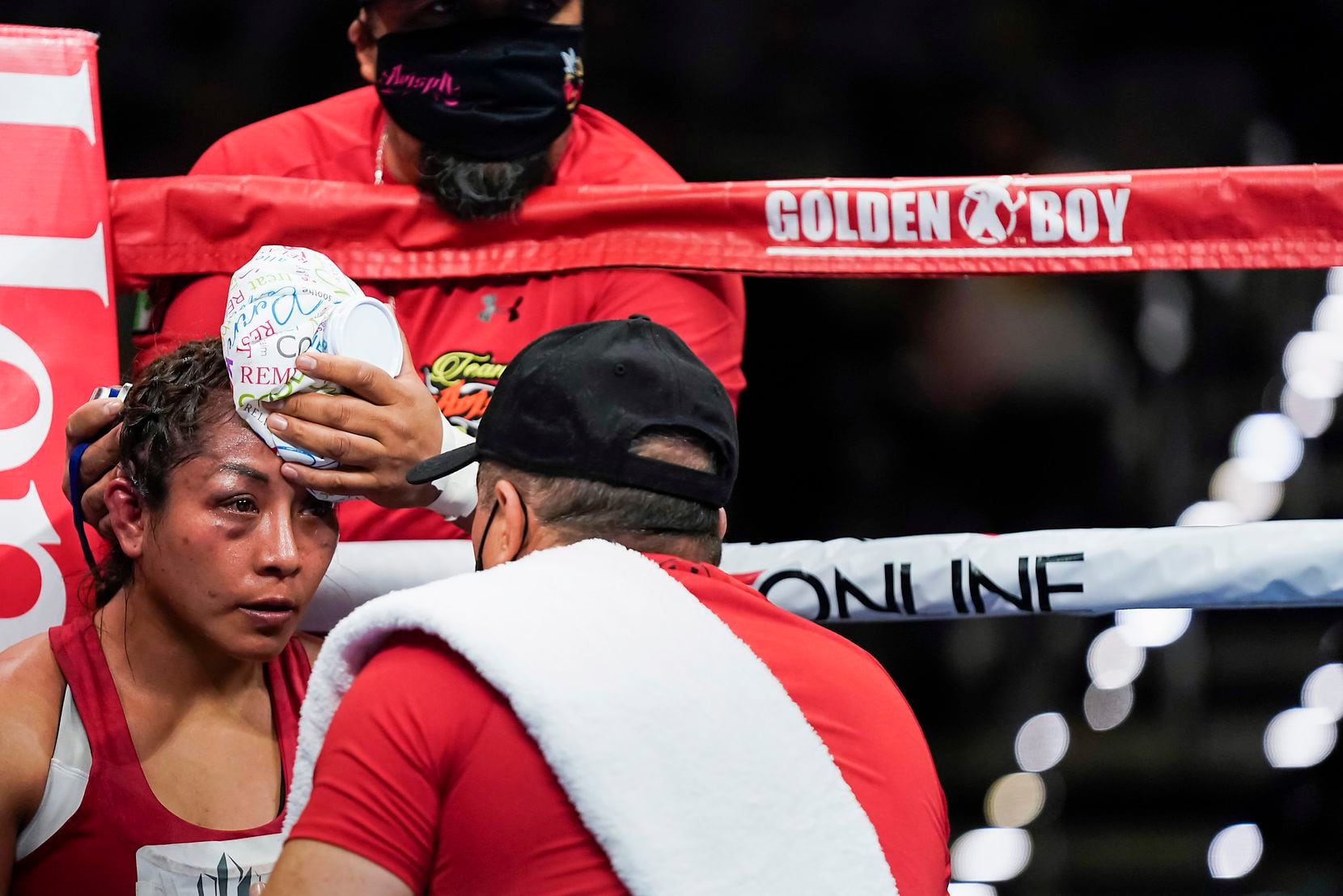 Anabel Ortiz gets ice to her forehead between rounds of a fight with Seniesa Estrada for the WBA women’s strawweight title at Dickies Arena on Saturday, March 20, 2021, in Fort Worth.