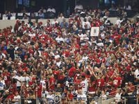 Lots of red was seen in the stands in a game between the Dallas Cowboys and San Francisco 49ers during the first half of play in the home opener at AT&T Stadium in Arlington, on Sunday, September 7, 2014.