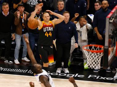 Dallas Mavericks bench Utah Jazz fans react after Utah Jazz forward Bojan Bogdanovic (44)...