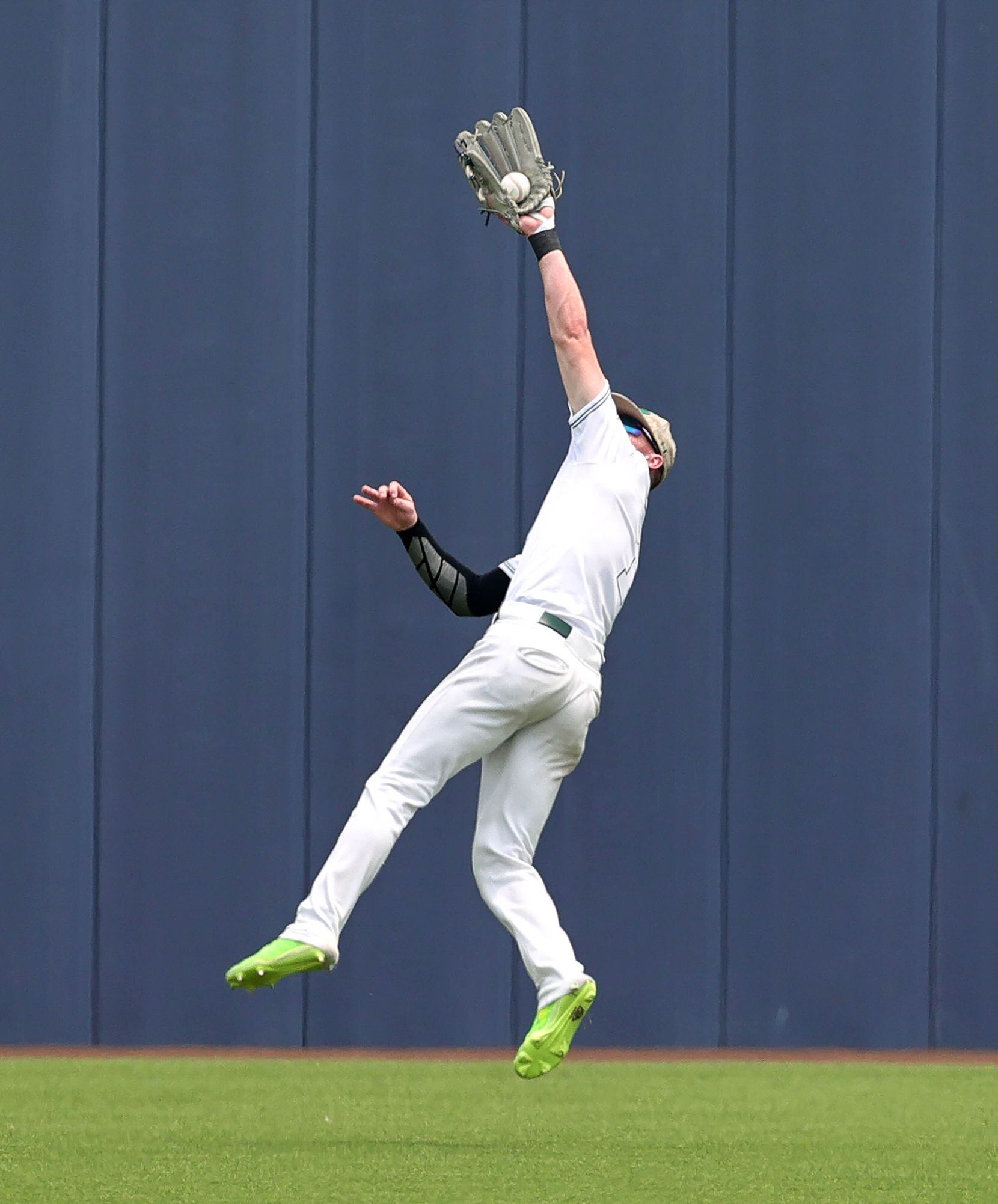 Prosper center fielder Jacob Nelson comes up with a nice catch against Coppell during game 3...