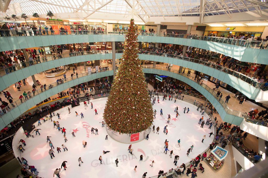 Galleria Dallas' holiday decorations include a huge indoor Christmas tree on the ice rink.