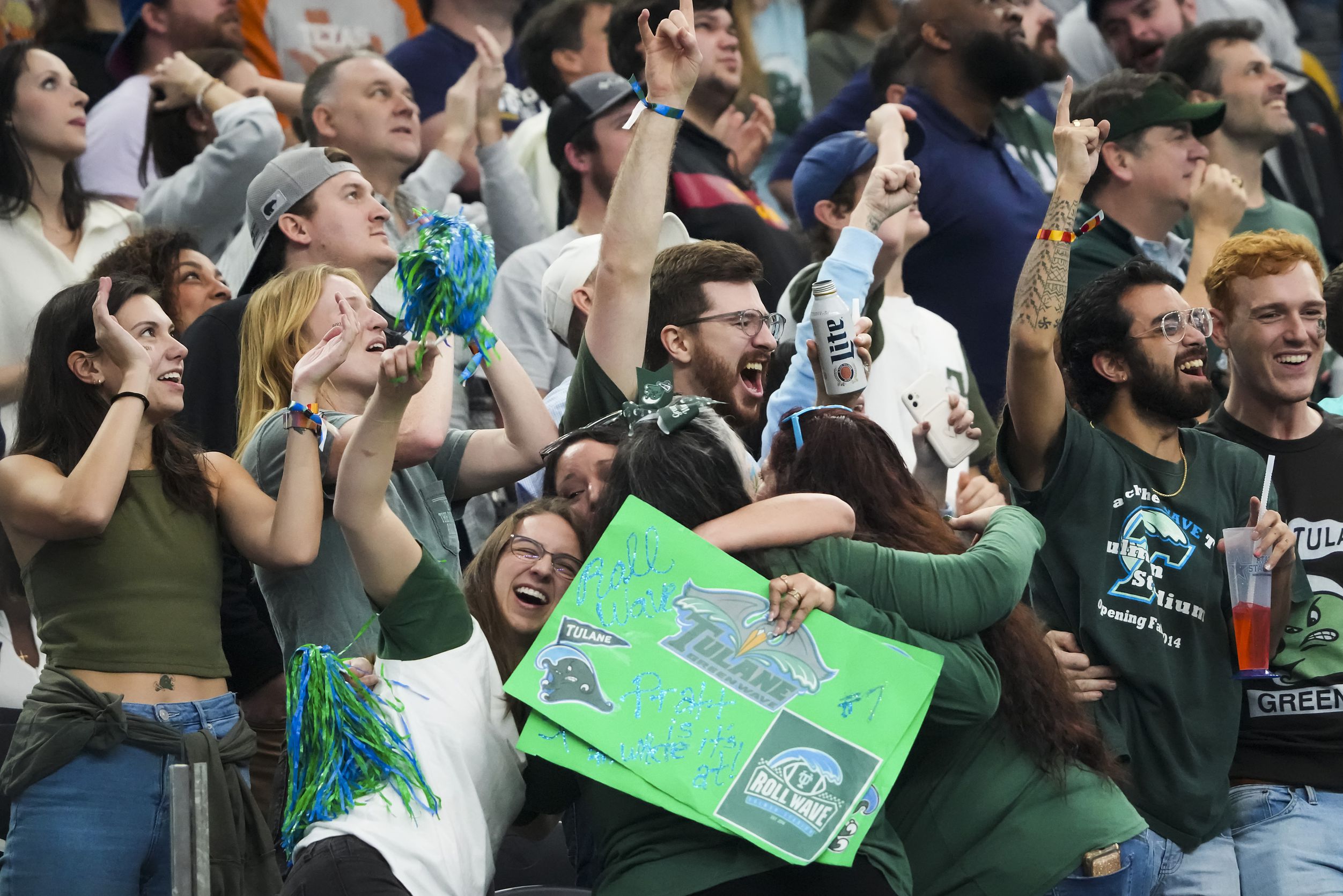 Tulane fans celebrate a Green Wave touchdown during the first half of the Cotton Bowl NCAA...