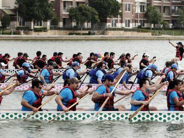 
Teams compete in the dragon boat races at the DFW Dragon Boat, Kite and Lantern Festival in...