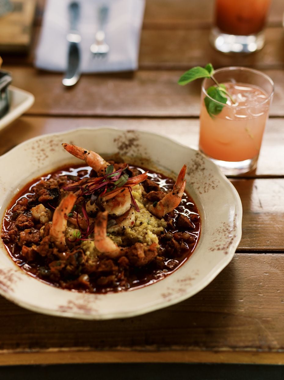 Haywire's shrimp and grits are made with tasso and andouille sausage red-eye gravy and green-chile white-cheddar grits.