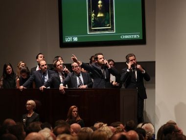 Bidding on the painting during the auction was intense. (Michelle V. Agins/The New York Times)