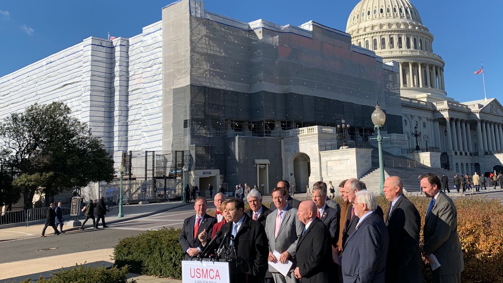 Seventeen members of Congress from Texas take part in a news conference to urge speedy ratification of the United States-Mexico-Canada Agreement in front of the U.S. Capitol on Dec. 5, 2019.