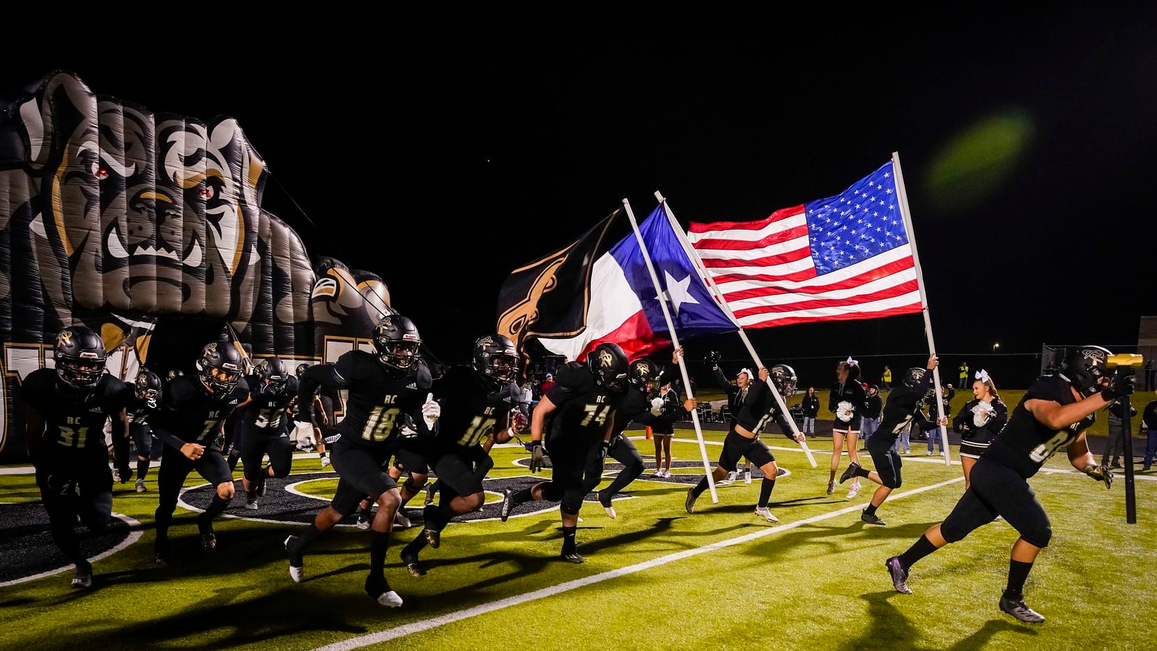 Royse City players take the field before a District 8-5A Division II high school football...