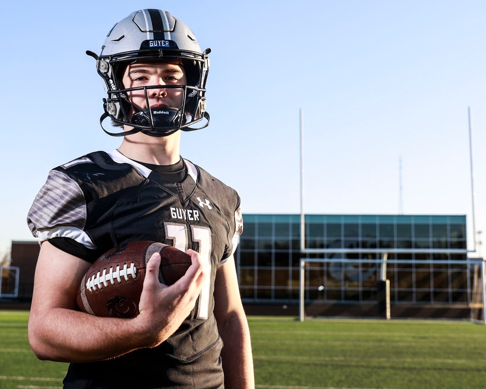 Quarterback Jackson Arnold poses for a portrait at Guyer High School Football Field  in...