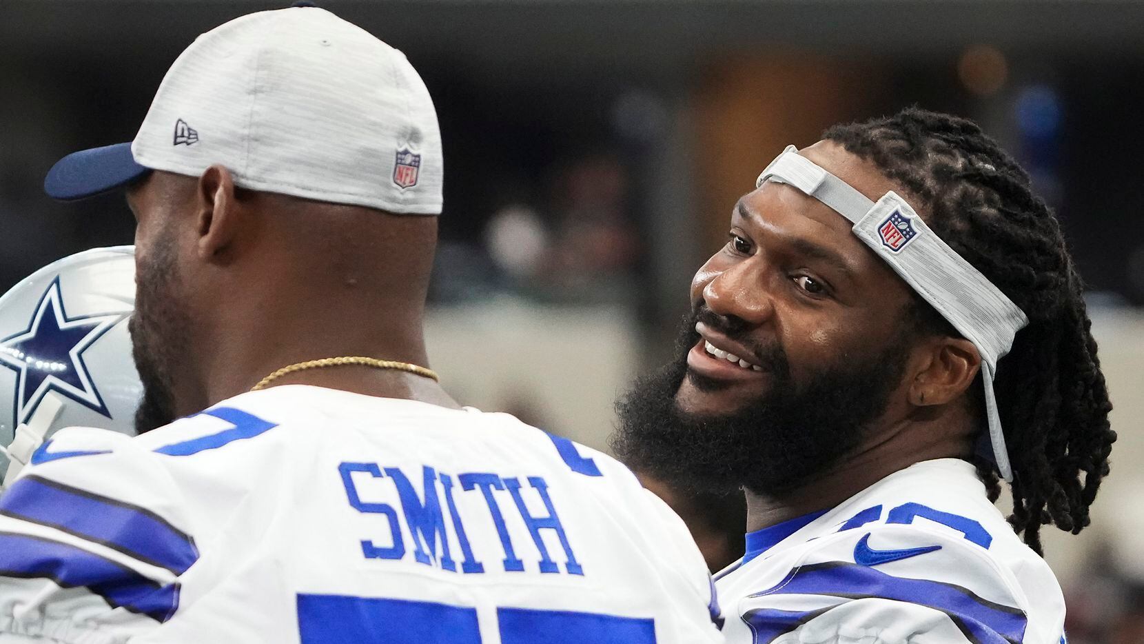 Dallas Cowboys offensive tackle Ty Nsekhe (79) talks with offensive tackle Tyron Smith (77)...
