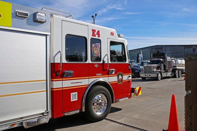 A fire truck enters the Republic Services company in Plano, Texas, Thursday, Dec. 29, 2016.