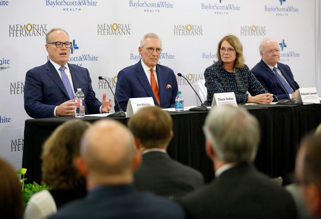 From left: Jim Hinton, CEO of Baylor Scott and White Health, speaks alongside Chuck Stokes,...