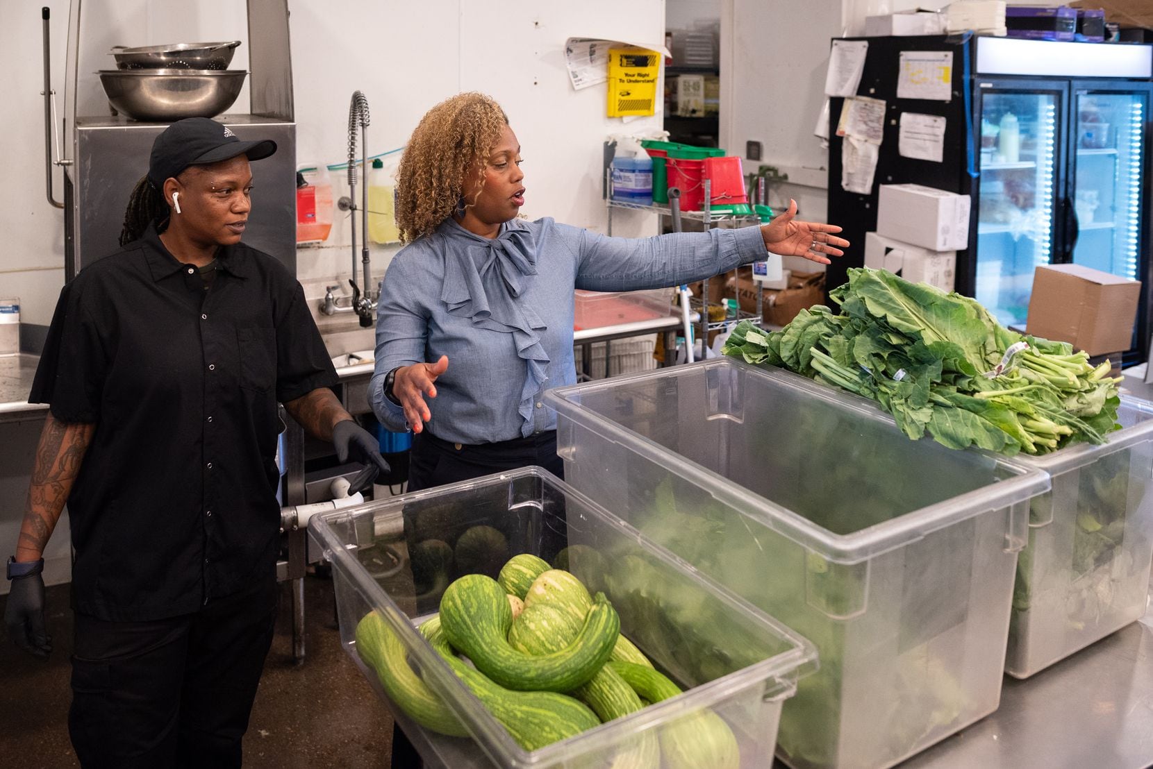 Cook Jamaica Mitchell, left, and Bonton Farms president Gabrielle "Gabe" Madison in the...