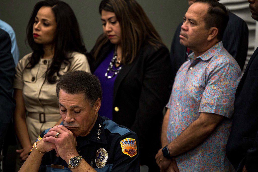 El Paso Police Chief Greg Allen (L) listens during a press briefing, following a mass fatal...