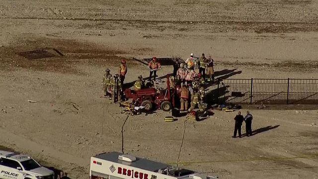 Frisco fire rescue personnel gather at the scene of an accident where a construction worker...