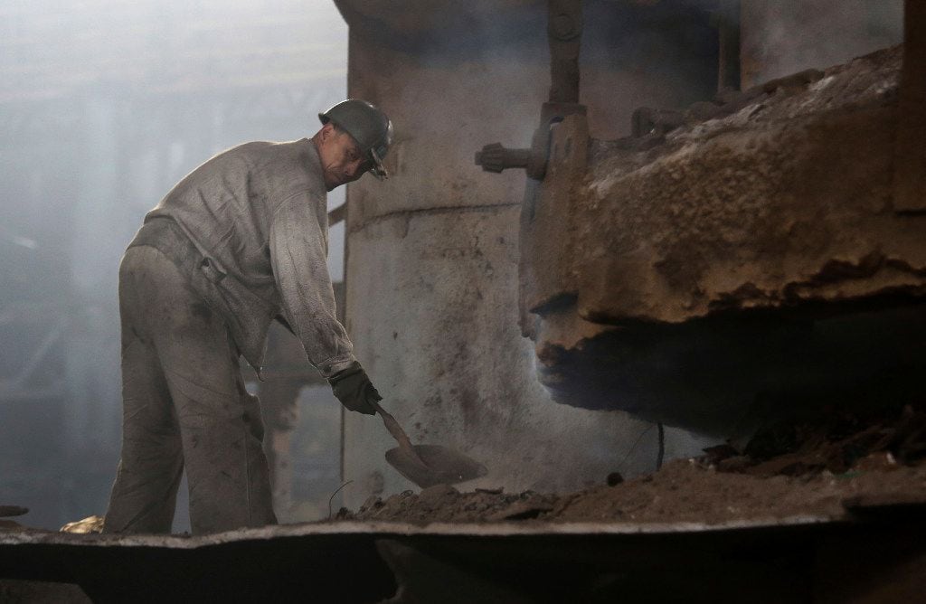 In this Saturday, Jan. 7, 2017 photo, a North Korean man works at the Chollima Steel Complex...